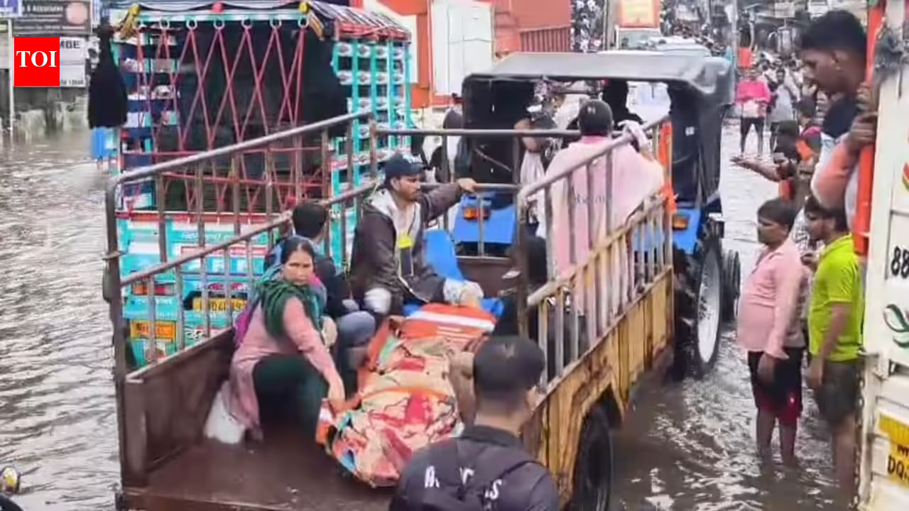 Doctor and his tractor rush to aid of woman in labour in flooded Nalasopara | Mumbai News