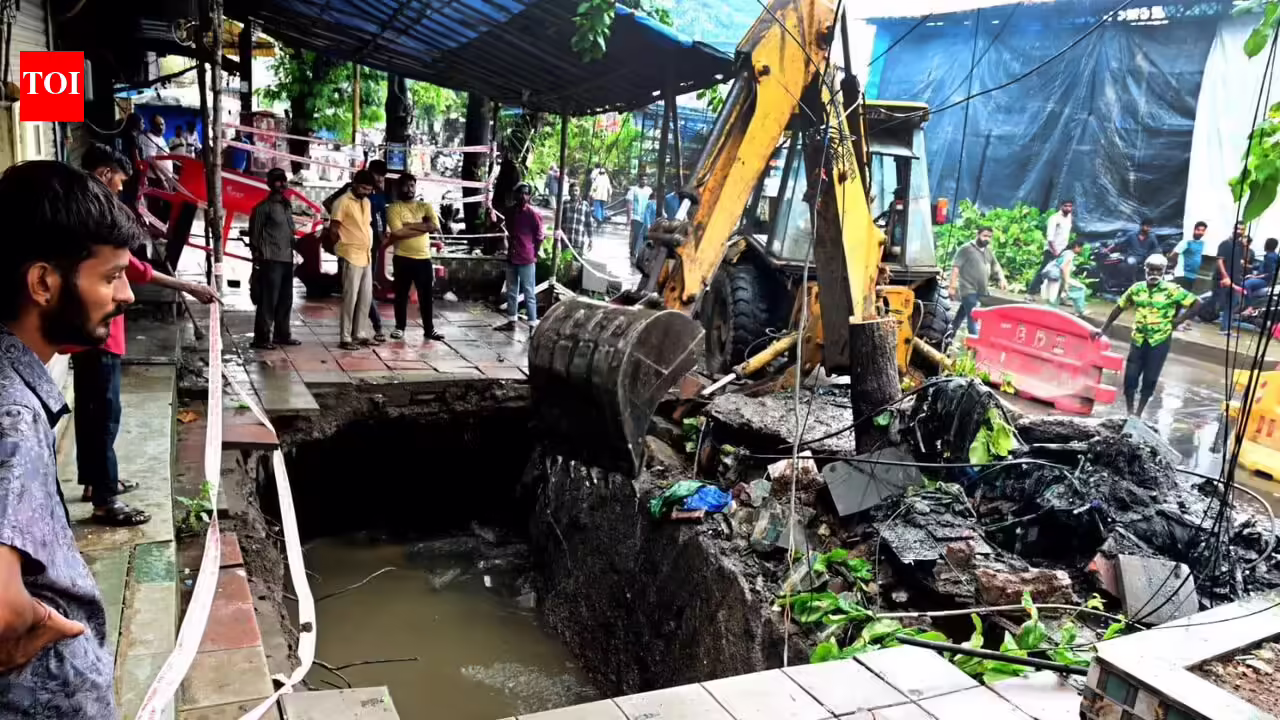 2 parked two-wheelers plunge into drain as Bhandup footpath caves in | Mumbai News